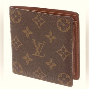 Louis Vuitton Vintage Marco Wallet in very good condition for a steal!